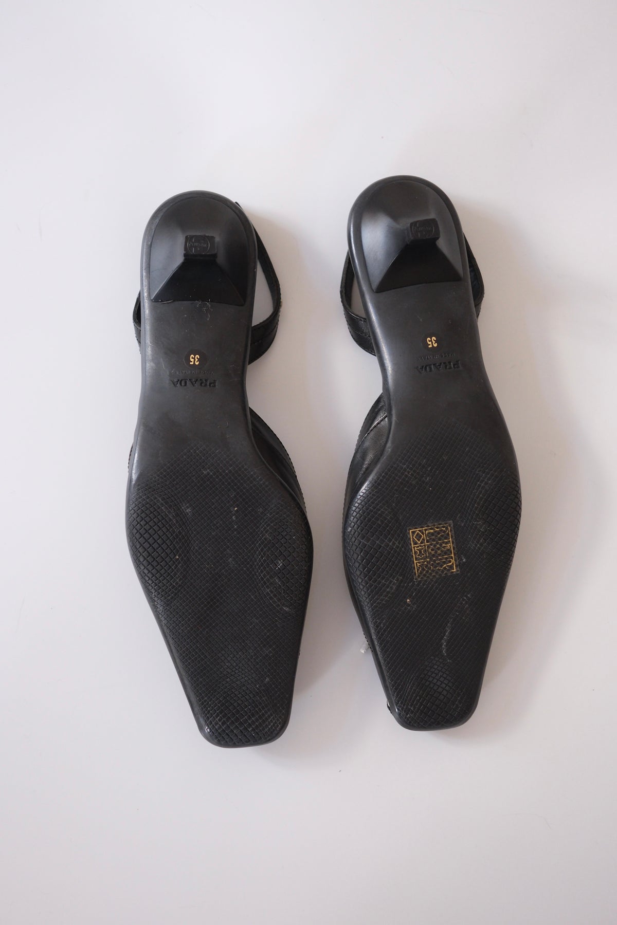 Prada black sporty slingback kitten heels