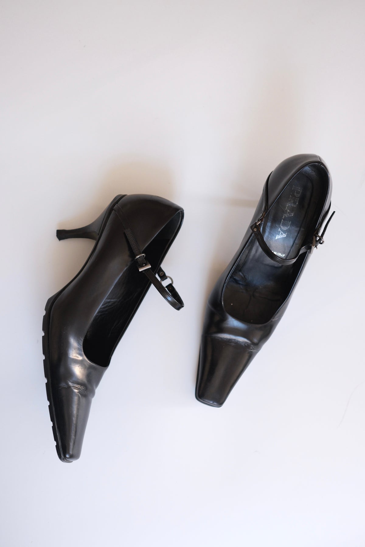 1990s Prada black leather pointy mary jane heels