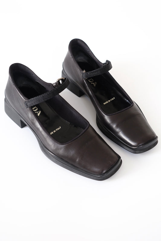 1990s Prada black leather square toe mary jane flats