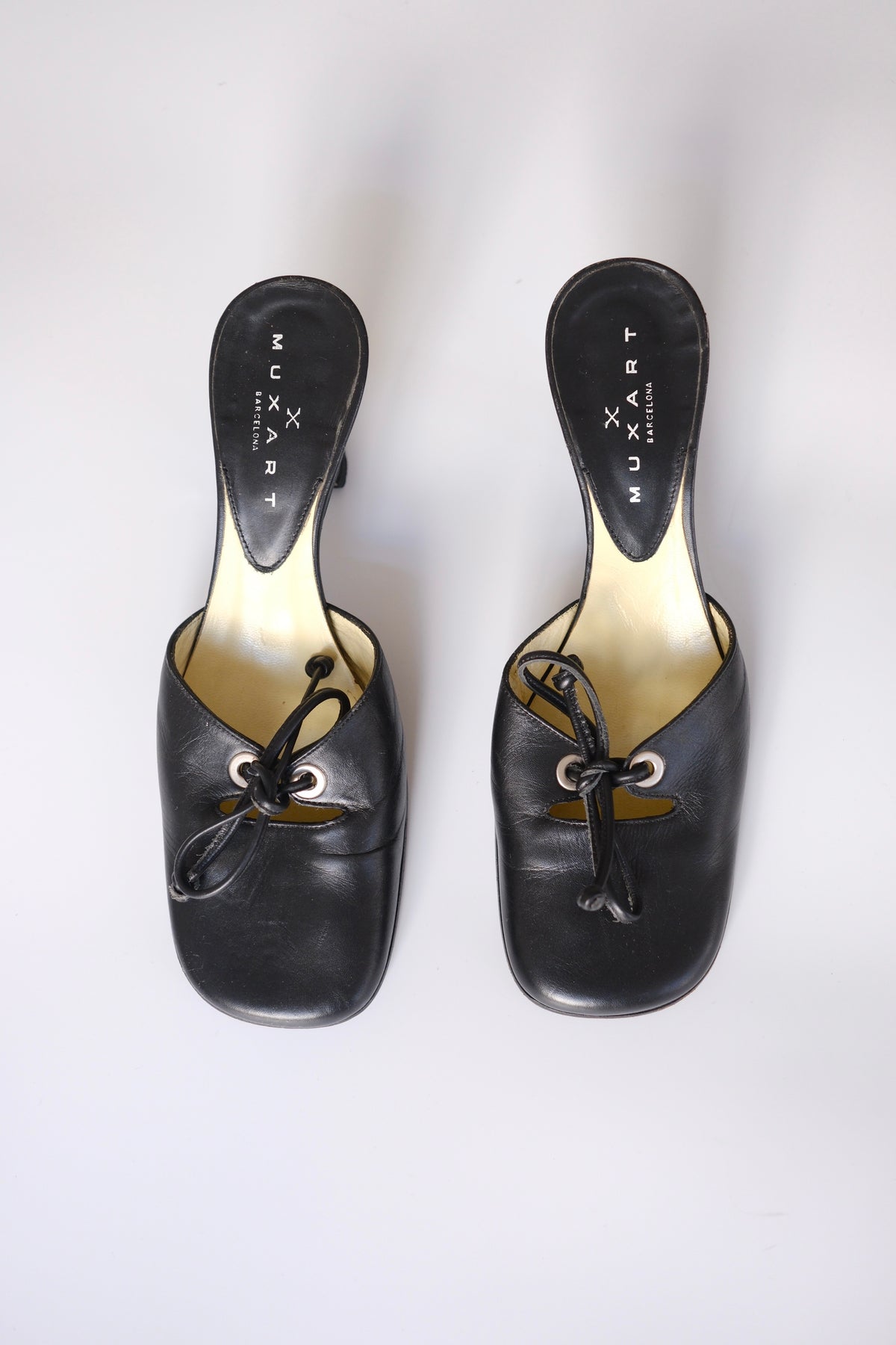 2000s Muxart black leather lace-up heeled mules