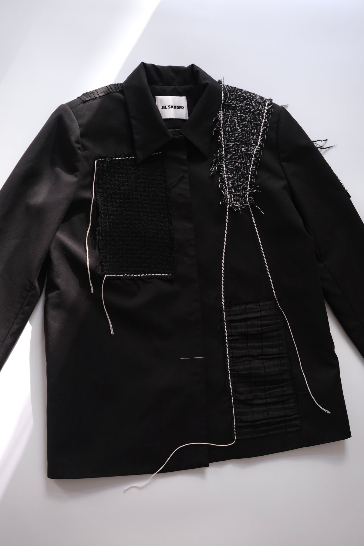 Jil Sander black jacket with tweed appliqués