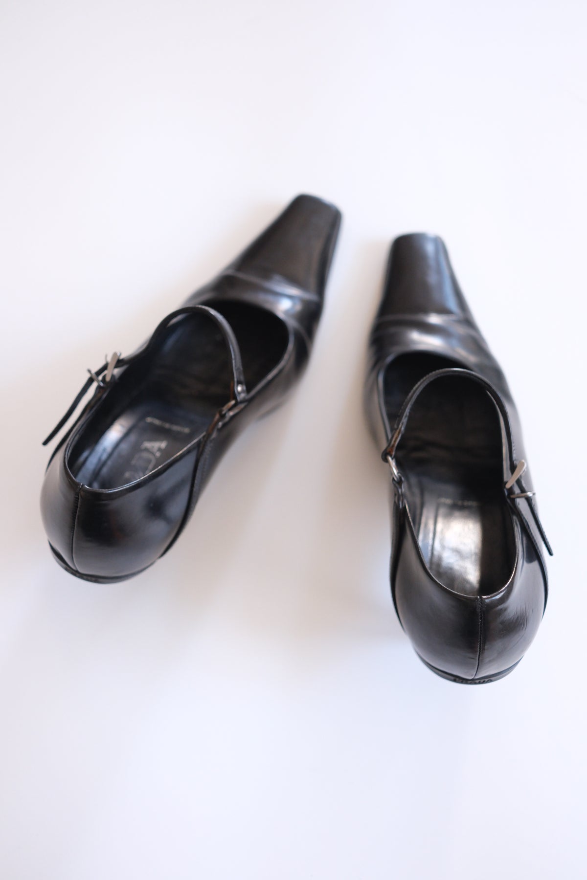1990s Prada black leather pointy mary jane heels