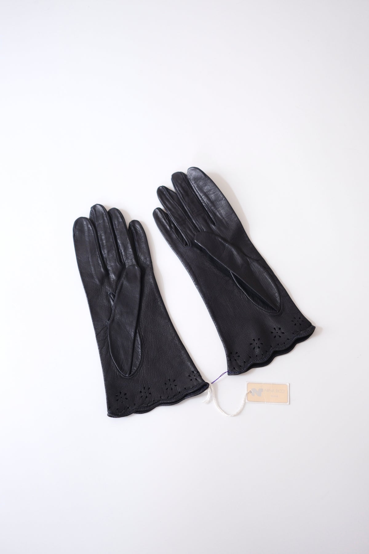 1990s Nina Ricci midnight blue leather gloves