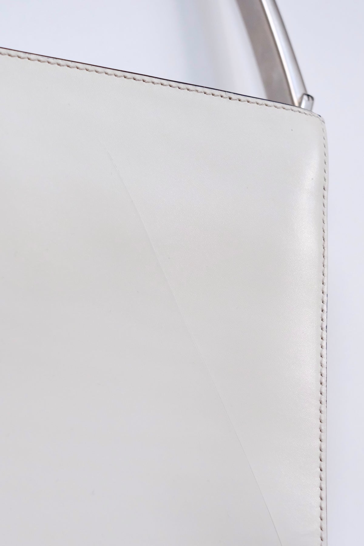 Prada FW 1998 white leather handbag with metal handle