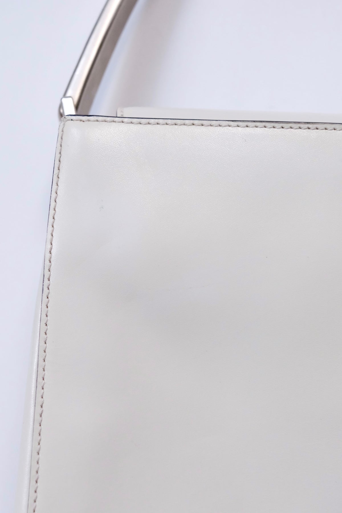 Prada FW 1998 white leather handbag with metal handle