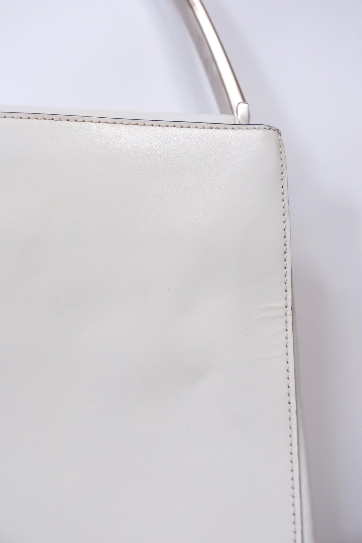 Prada FW 1998 white leather handbag with metal handle