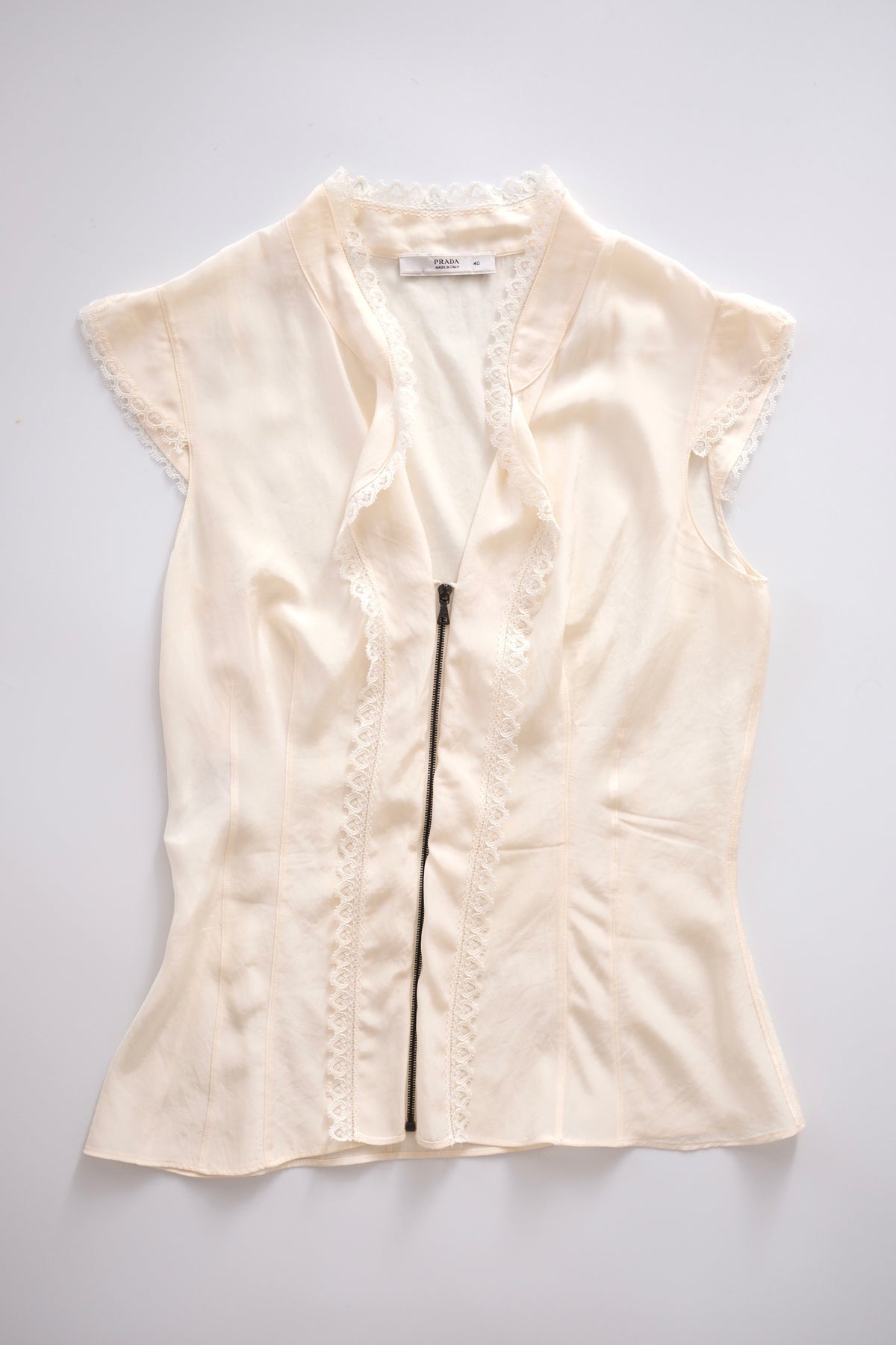 Prada semi-sheer cream zip-up blouse
