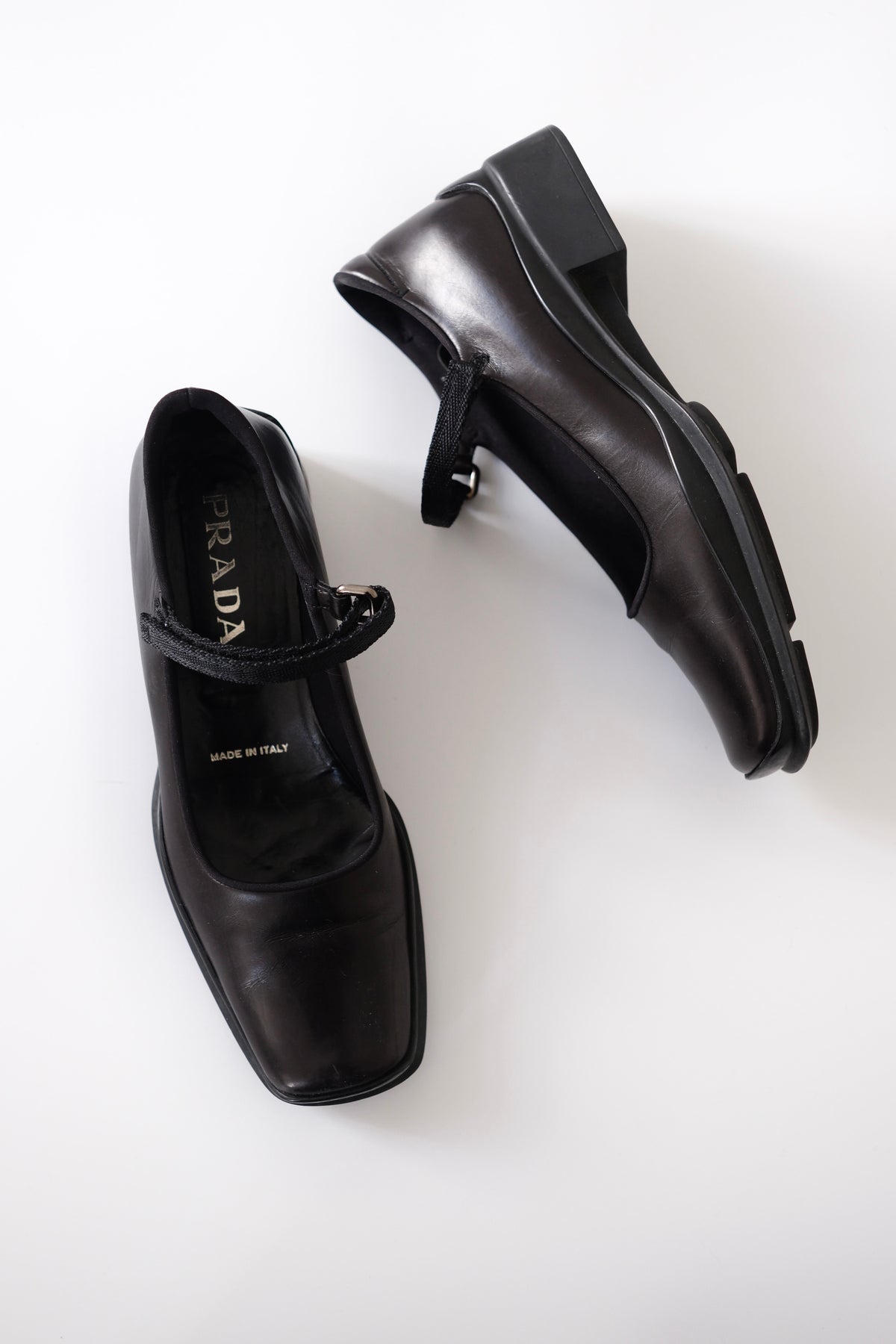 1990s Prada black leather square toe mary jane flats